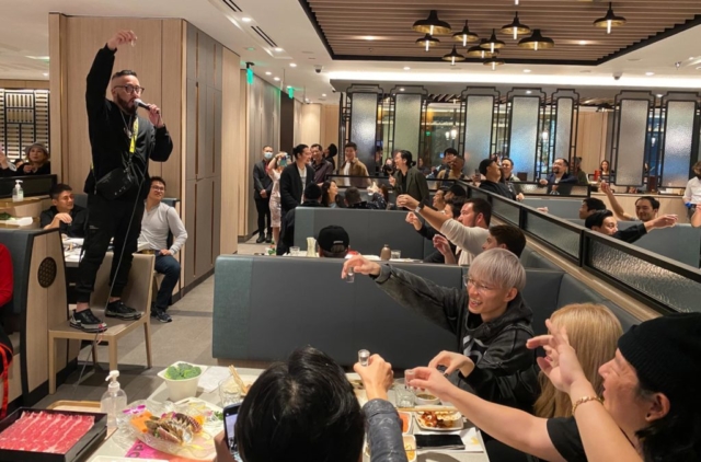 Kevin Yang makes a toast to Asian American equal rights at Hot Pot during NFT LA.