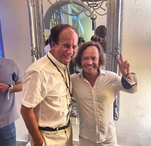 JD Lasica and Brock Pierce during an evening event at Brock's Monastery in Old San Juan.
